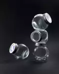 Снимка 4 на Стилен стъклен буркан за подправки, ядки и кафе - 150 мл
